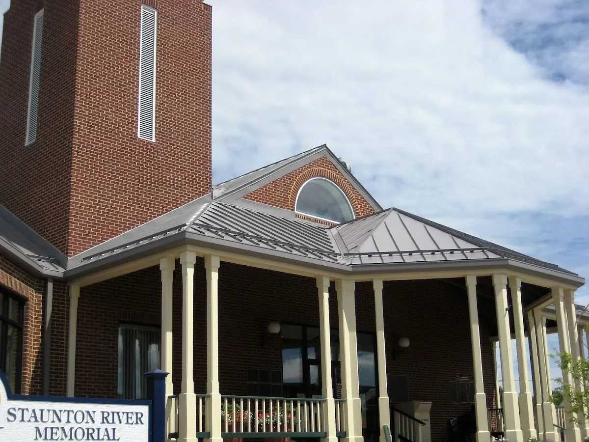 Skilled roofing craftsmen working on a residential roof in Altoona